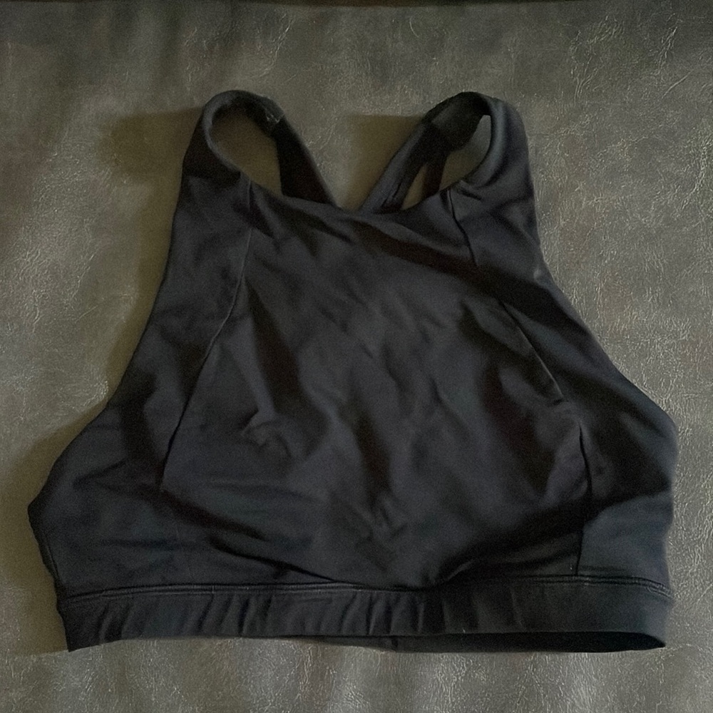 Lululemon Size 4. High neck sports bra. Black. Worn. No stains or holes.